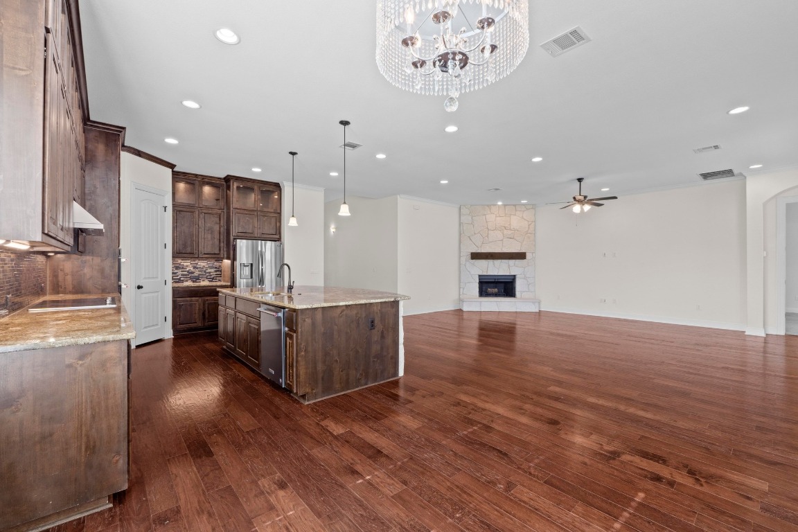200 Tate Lane Round Rock, TX 78665 - Photo 10 of 40 a view of kitchen with cabinets and wooden floor