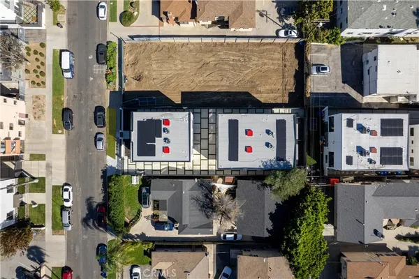 a kitchen with a sink stainless steel appliances and cabinets