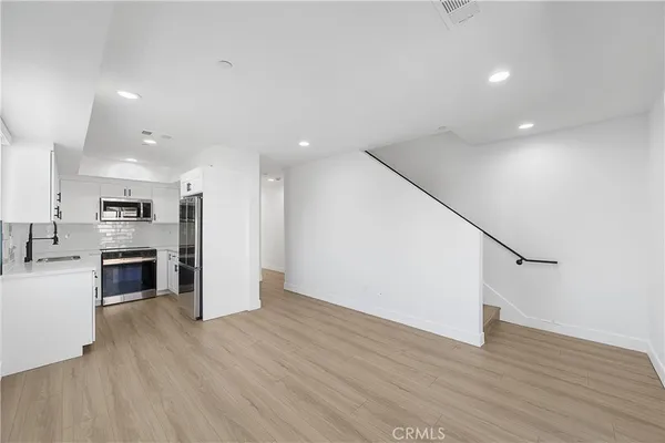 a bathroom with a toilet sink and shower