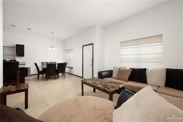 a bedroom with a bed and a table