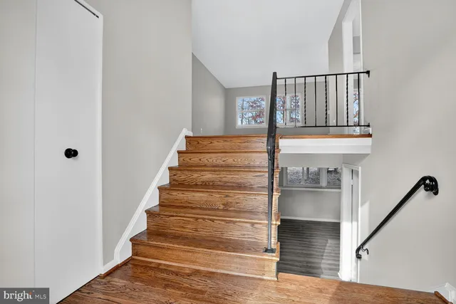 a view of entryway with wooden floor