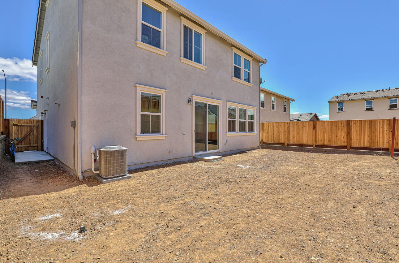 1400 Winzer Place Gilroy, CA 95020 - Photo 14 of 33 a view of a house with a yard