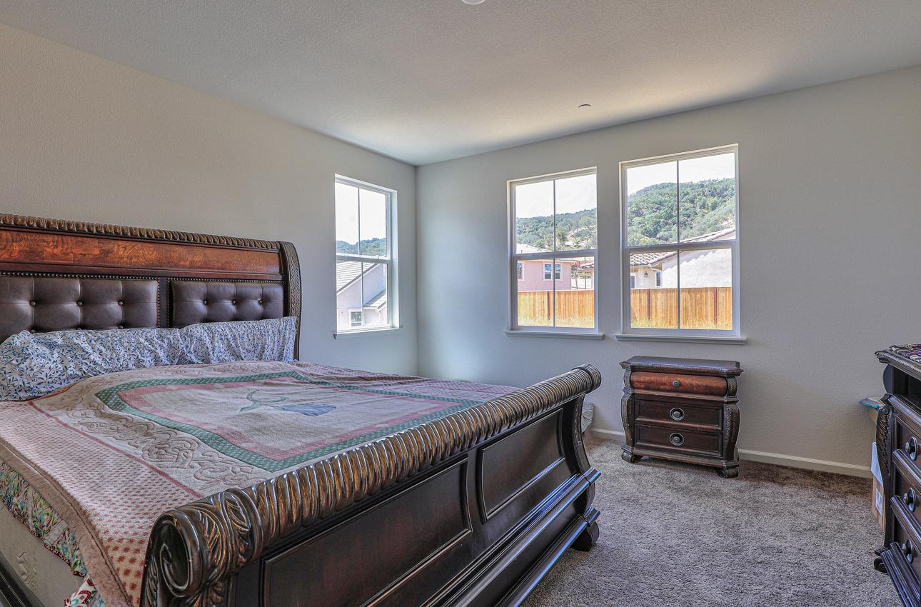 1400 Winzer Place Gilroy, CA 95020 - Photo 19 of 33 a bedroom with a bed and a window
