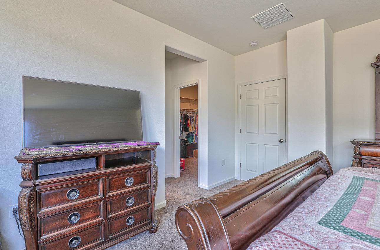 1400 Winzer Place Gilroy, CA 95020 - Photo 21 of 33 a living room with furniture and a flat screen tv
