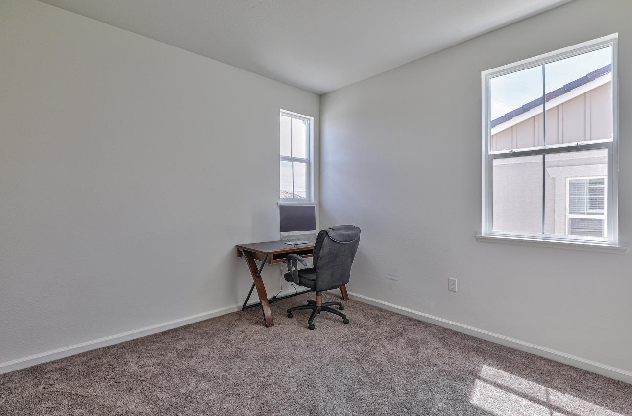 1400 Winzer Place Gilroy, CA 95020 - Photo 25 of 33 a bench sitting in a room next to a window