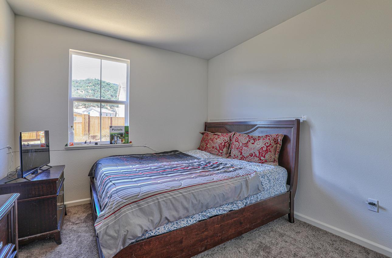 1400 Winzer Place Gilroy, CA 95020 - Photo 29 of 33 a bedroom with a bed and wooden floor