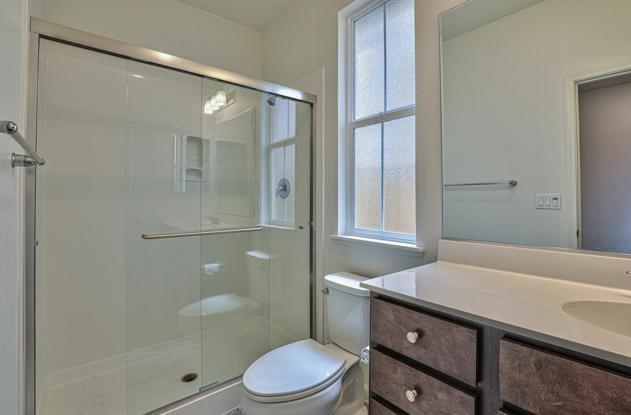 1400 Winzer Place Gilroy, CA 95020 - Photo 6 of 33 a bathroom with a sink a toilet and shower