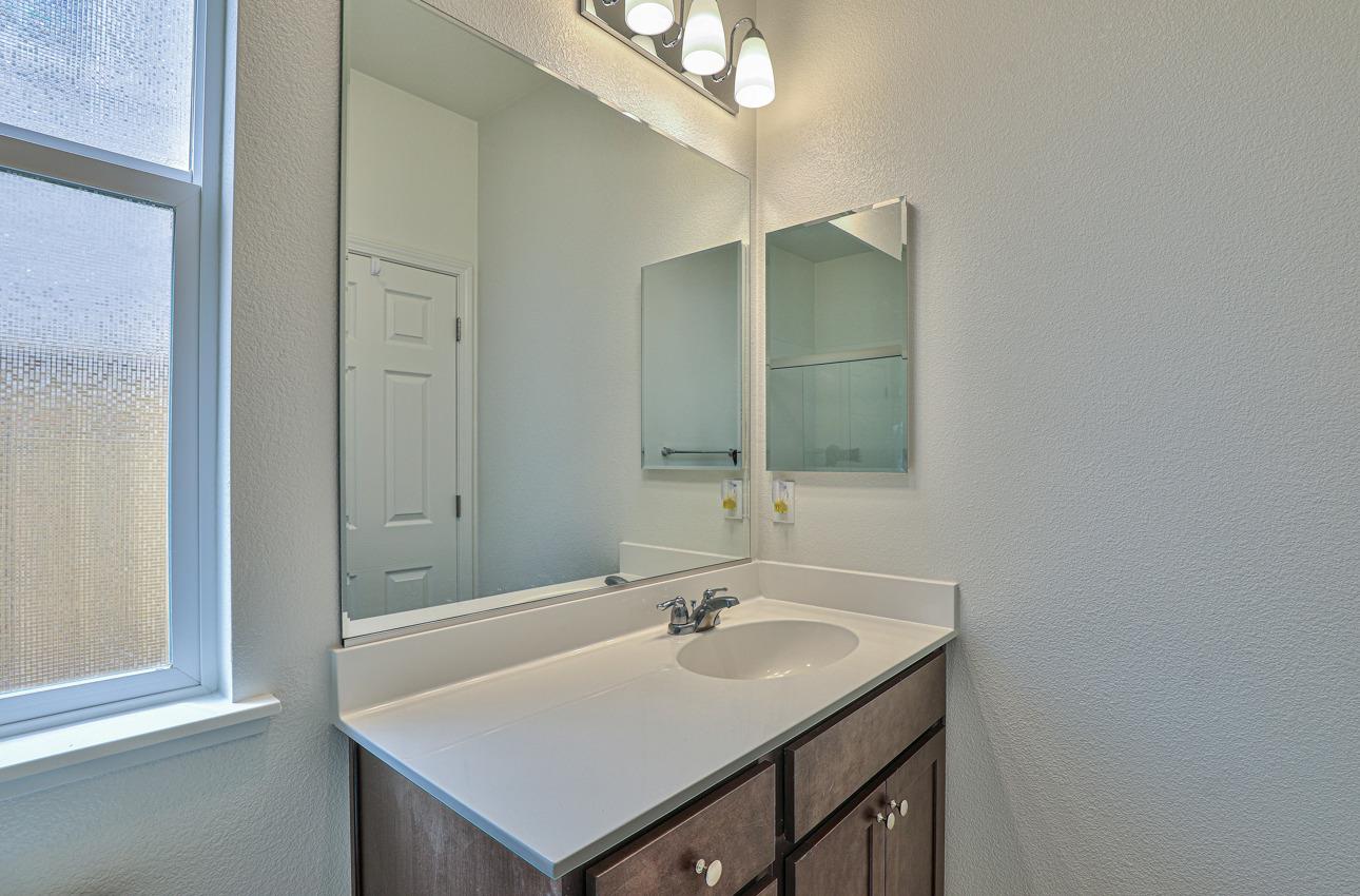 1400 Winzer Place Gilroy, CA 95020 - Photo 7 of 33 a bathroom with a sink and a mirror