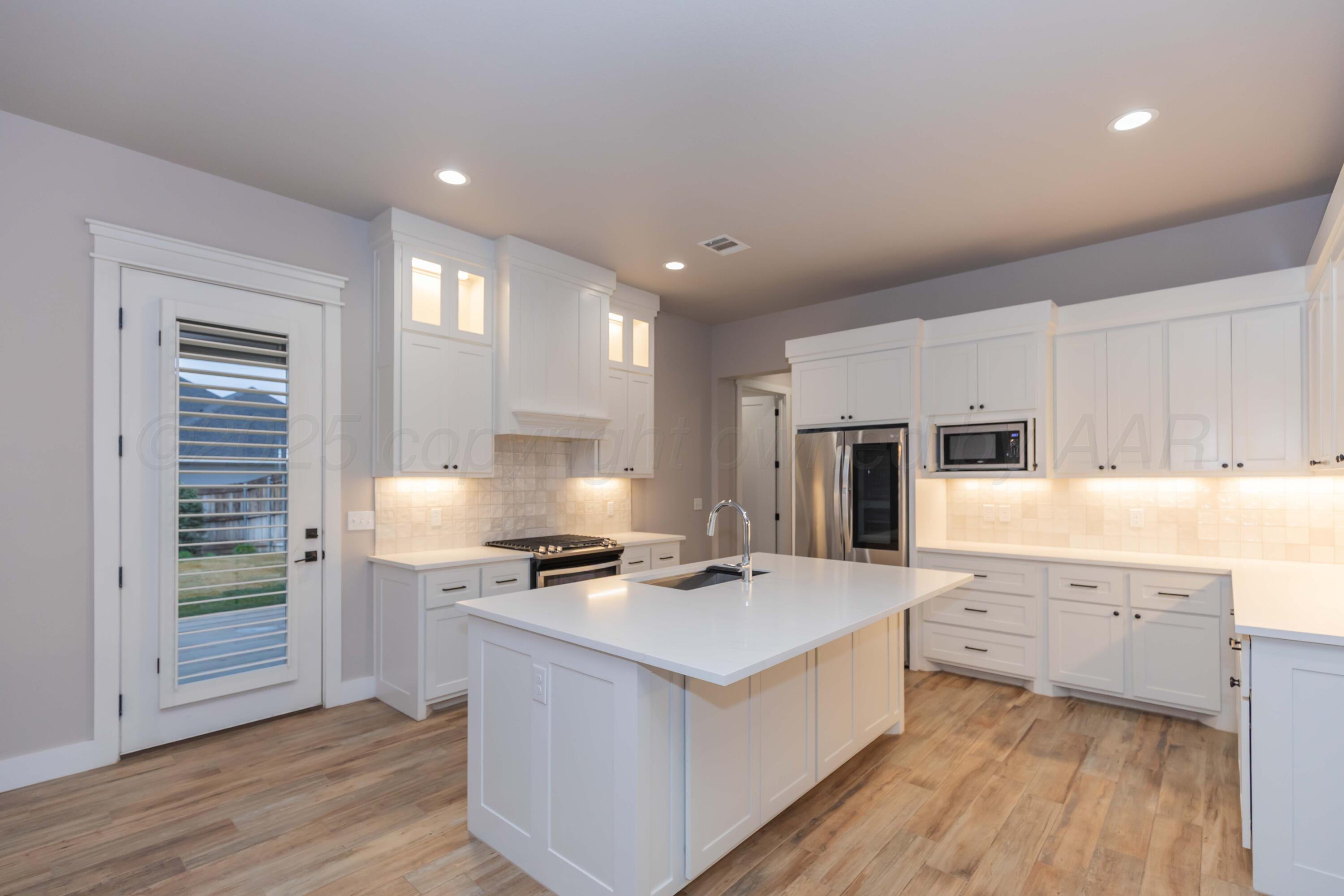 6206 Foley Square Street Amarillo, TX 79119 - Photo 13 of 73 KITCHEN VIEW 1