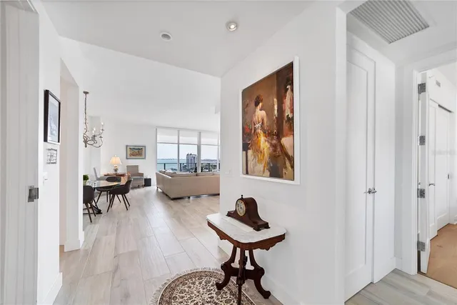 a view of a livingroom with furniture and a window