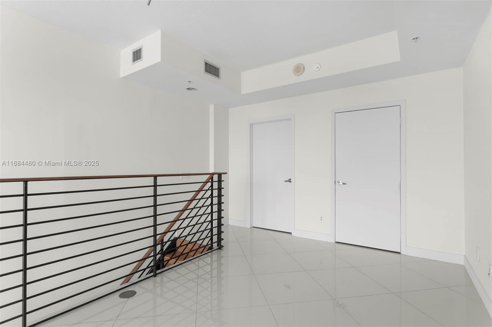 60 Southwest 13th Street, Unit 3213 Miami, FL 33130 - Photo 16 of 23 a view of a hallway