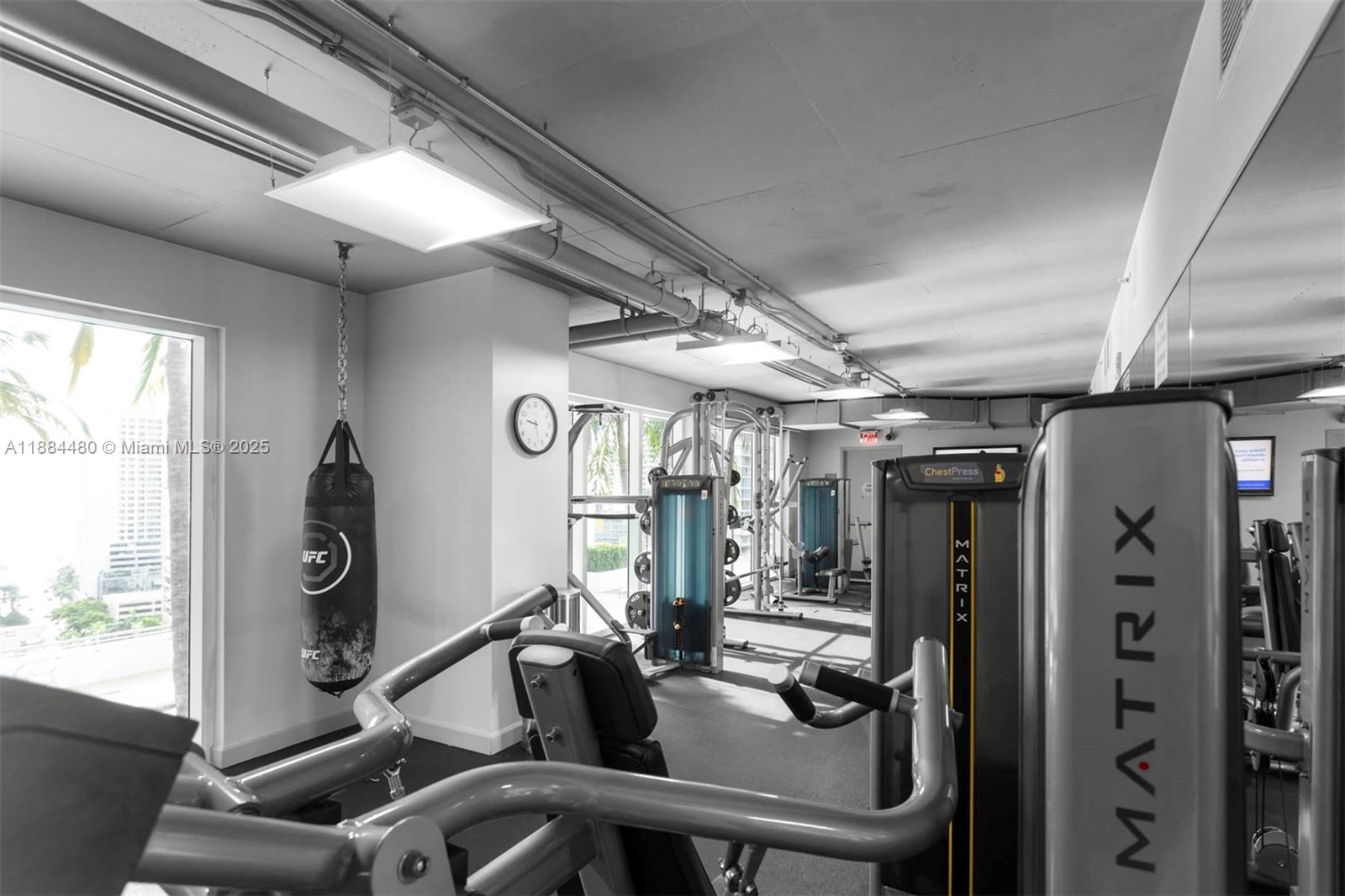 60 Southwest 13th Street, Unit 3213 Miami, FL 33130 - Photo 23 of 23 a view of a room with gym equipment