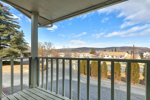a view of city from a balcony