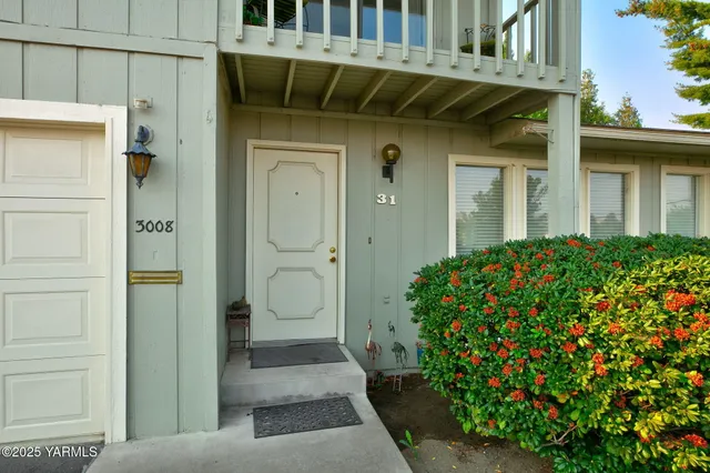 view of a house with a flower garden
