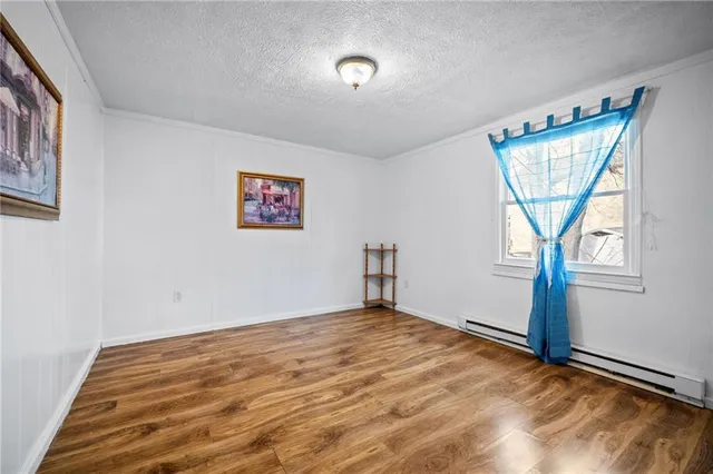 a view of room with window and ceiling fan