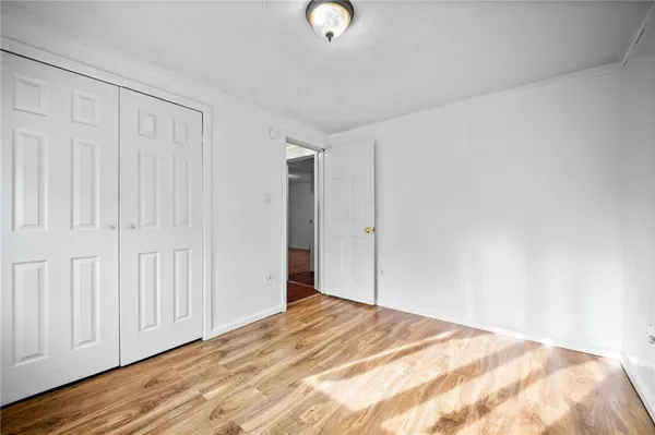 a view of a livingroom with wooden floor