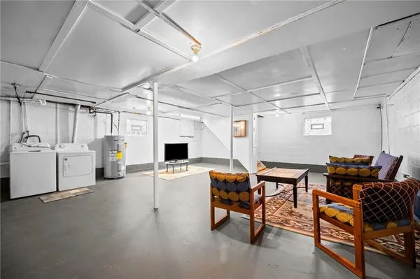 a outdoor space with lots of white furniture