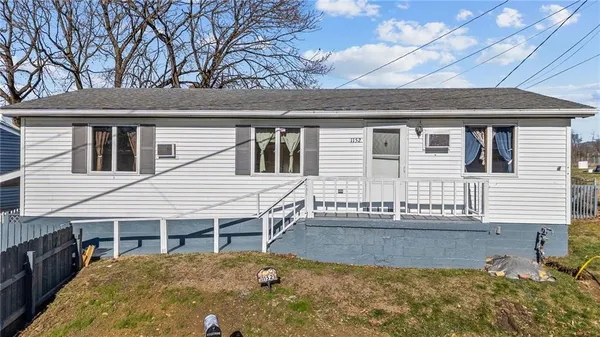 a house view with a outdoor space