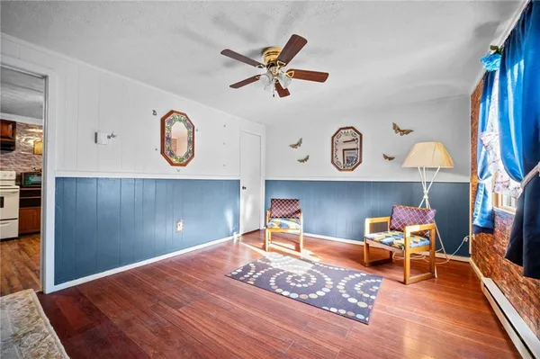 a workspace with furniture and wooden floor