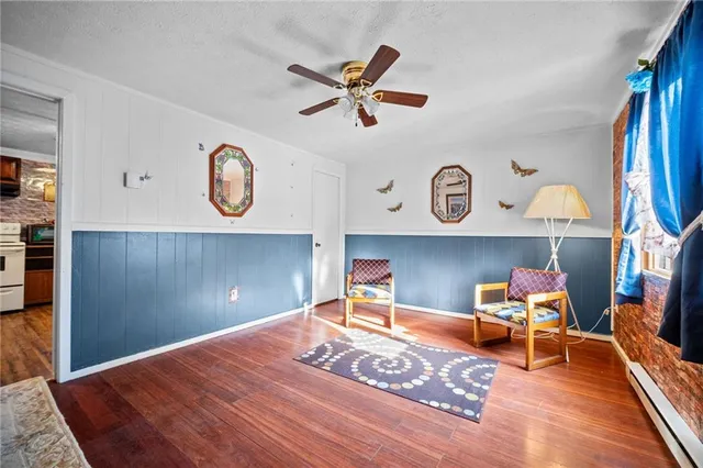 a workspace with furniture and wooden floor