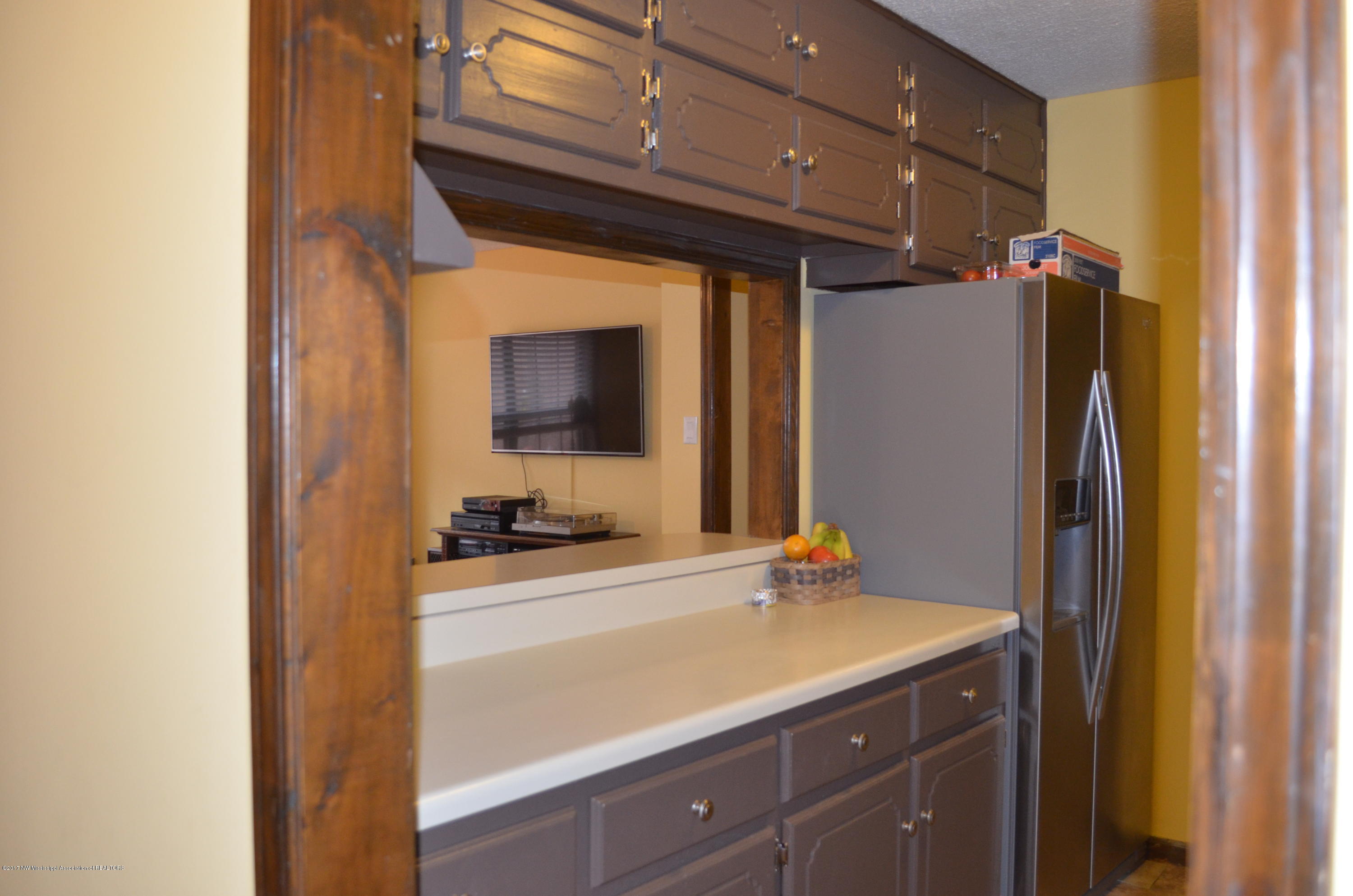 4925 Belmont Road Hernando, MS 38632 - Photo 4 of 22 View into the den