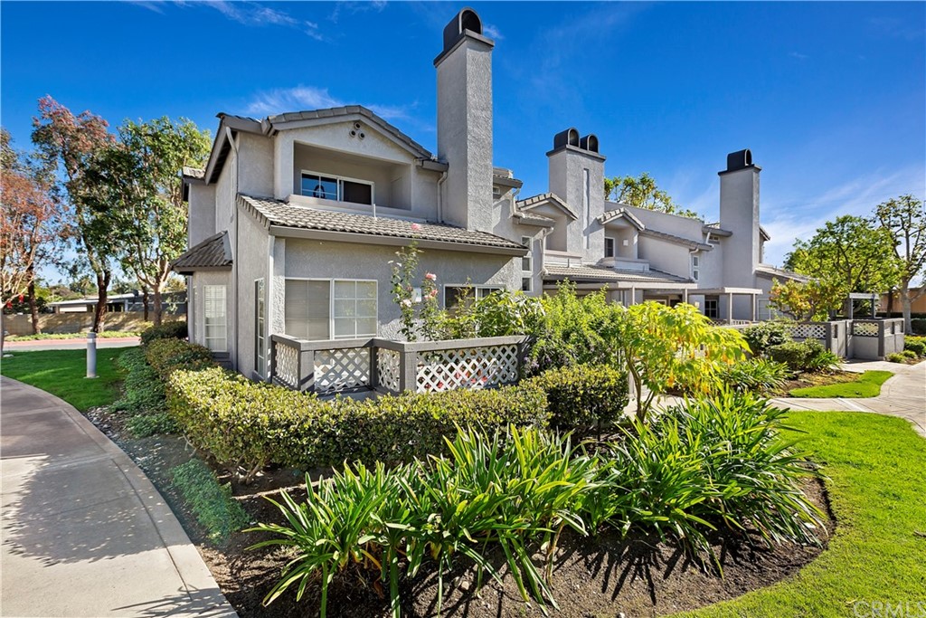 8284 Chappellet Place Rancho Cucamonga, CA 91730 - Photo 1 of 1 a front view of a house with a garden
