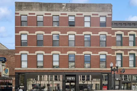 a front view of a brick building