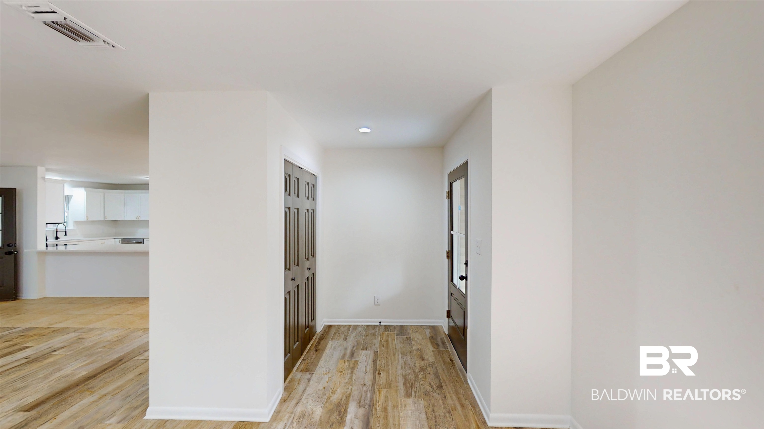 22711 Highway 98 Foley, AL 36535 - Photo 19 of 74 Hallway with light wood finished floors and recessed lighting