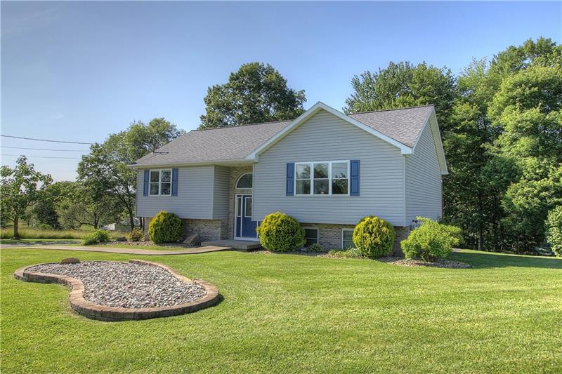 132 Rieger Road Butler, PA 16001 - Photo 2 of 25 Lot is over an acre, level and partially wooded. Lovely updated landscaping!