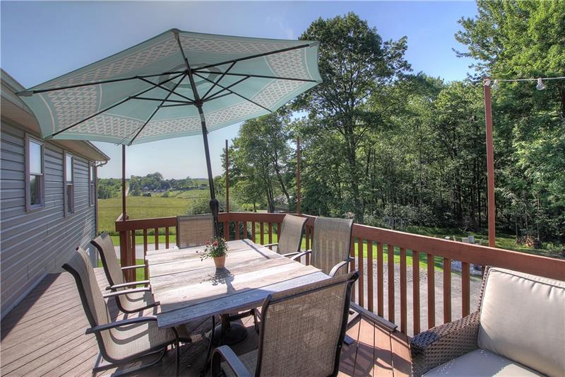 132 Rieger Road Butler, PA 16001 - Photo 19 of 25 This is just 1/2 of the back deck...and it accommodates a table for 6 with ease. The other side still has room for your grill, patio furniture, etc.
