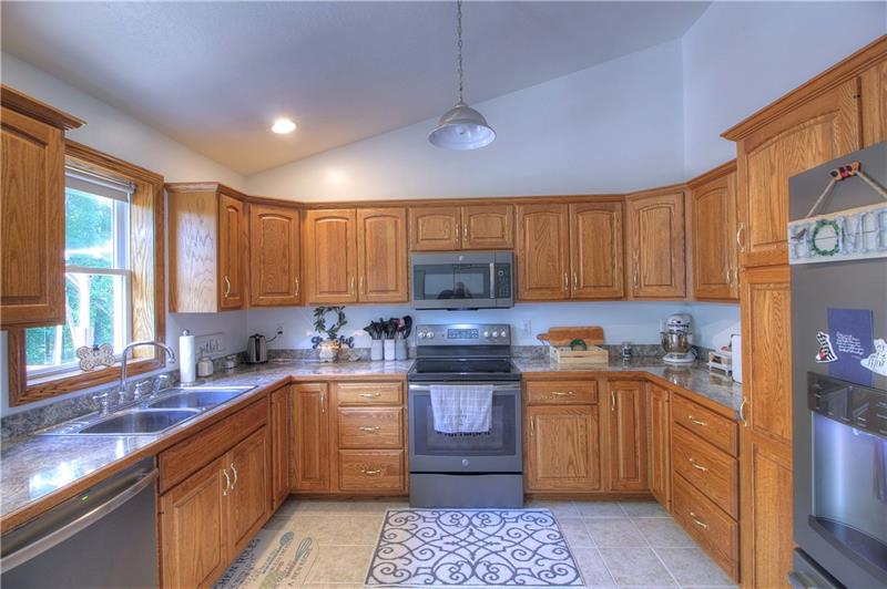 132 Rieger Road Butler, PA 16001 - Photo 6 of 25 This large kitchen has everything you need! Tons of cabinets, lots of counter space, newer matching GE appliances, and a high ceiling!