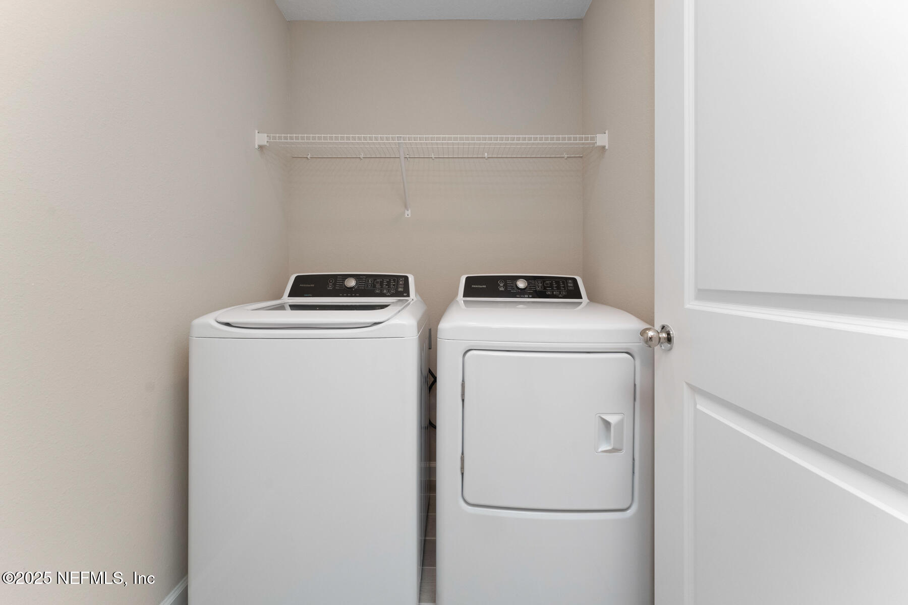 1171 Beach Dune Drive Jacksonville, FL 32233 - Photo 17 of 27 a utility room with dryer and washer