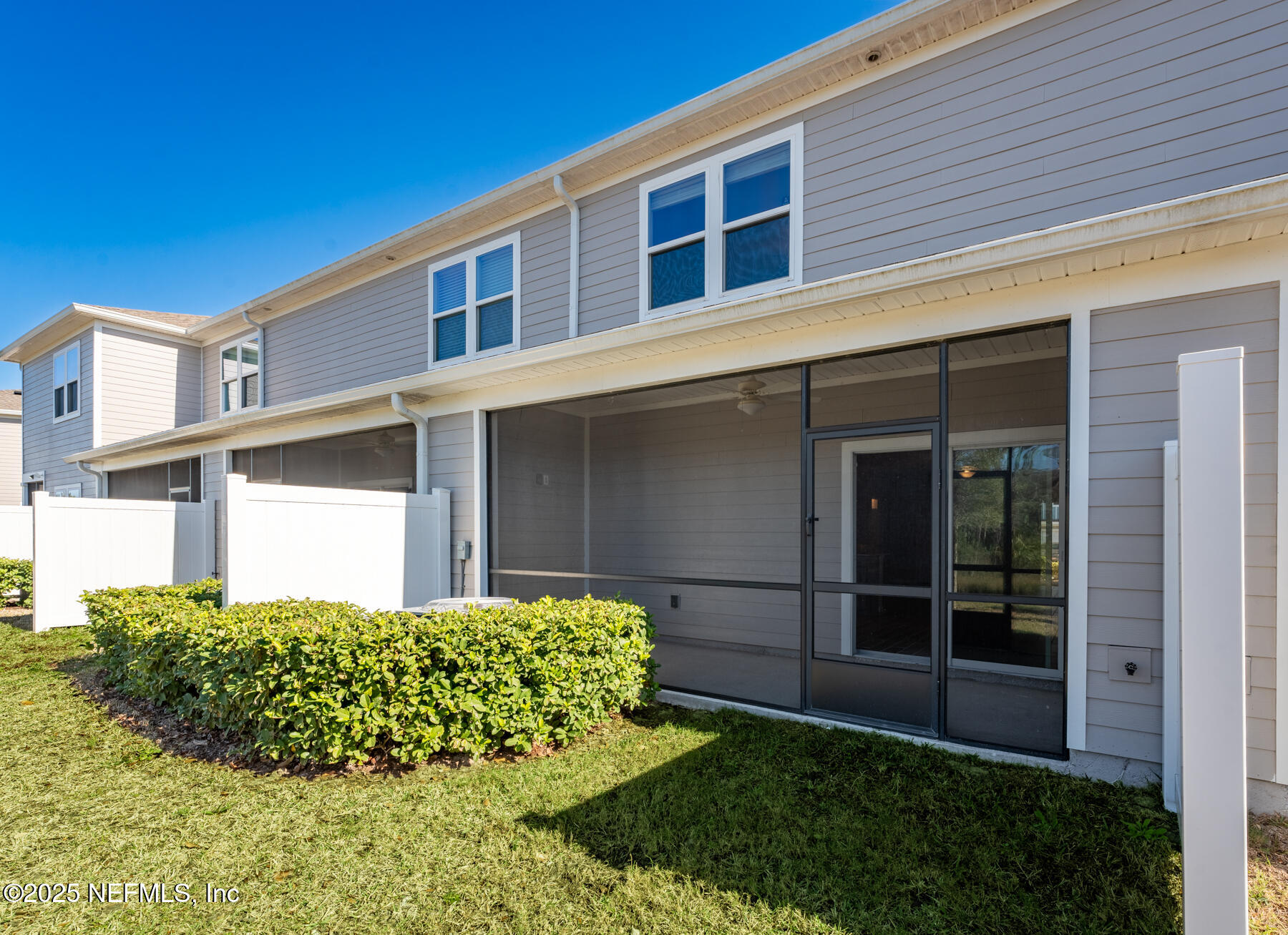 1171 Beach Dune Drive Jacksonville, FL 32233 - Photo 19 of 27 a front view of a house with a garden
