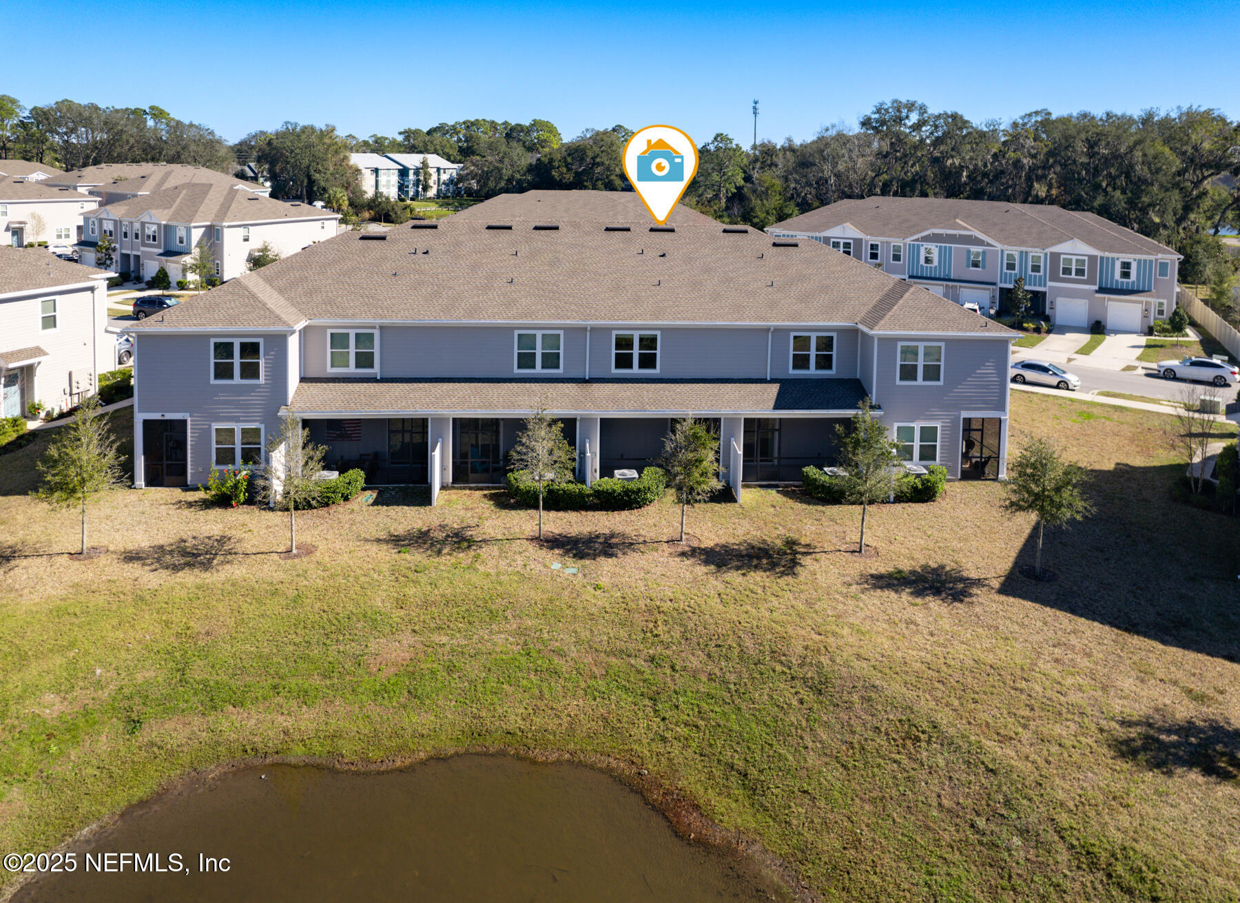 1171 Beach Dune Drive Jacksonville, FL 32233 - Photo 22 of 27 a front view of a house with a yard