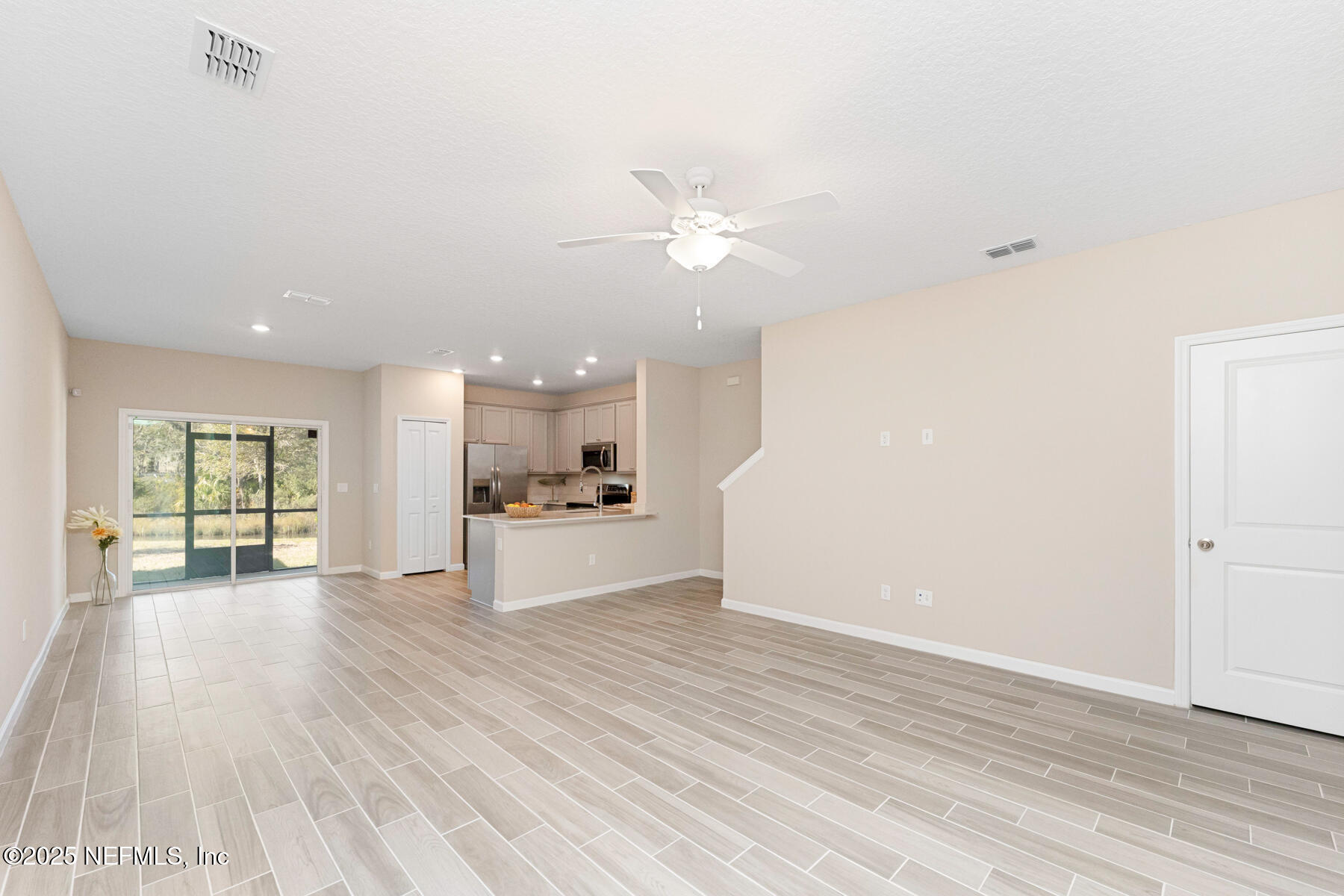1171 Beach Dune Drive Jacksonville, FL 32233 - Photo 26 of 27 a view of a kitchen with a sink and a window
