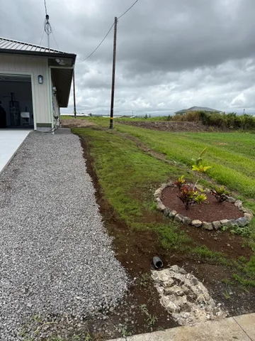 a big yard with table and chairs