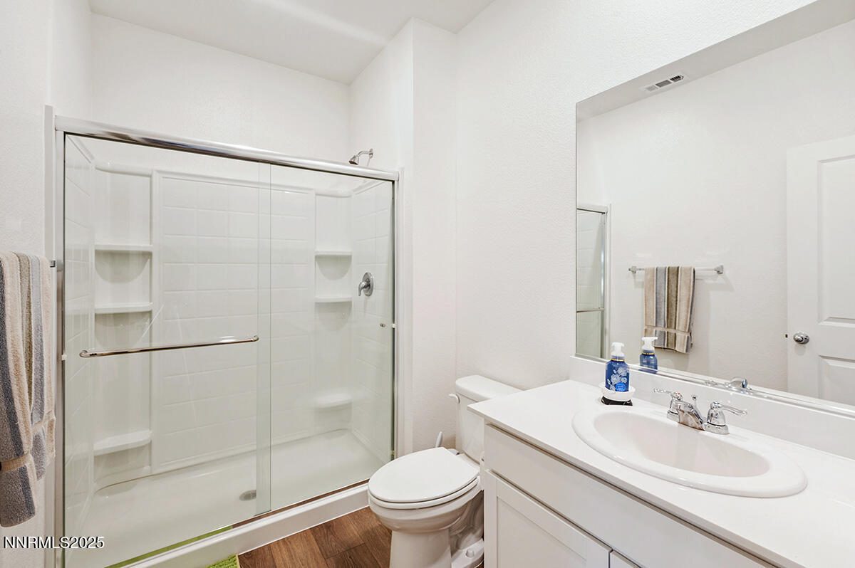 720 Butte Crk Road Dayton, NV 89403 - Photo 14 of 25 a bathroom with a sink toilet and shower