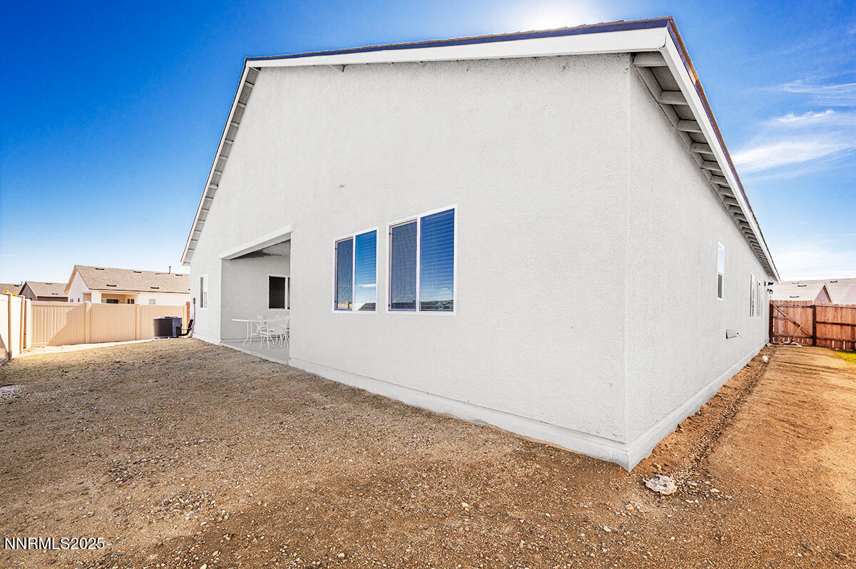 720 Butte Crk Road Dayton, NV 89403 - Photo 23 of 25 a view of a big room with closet and windows