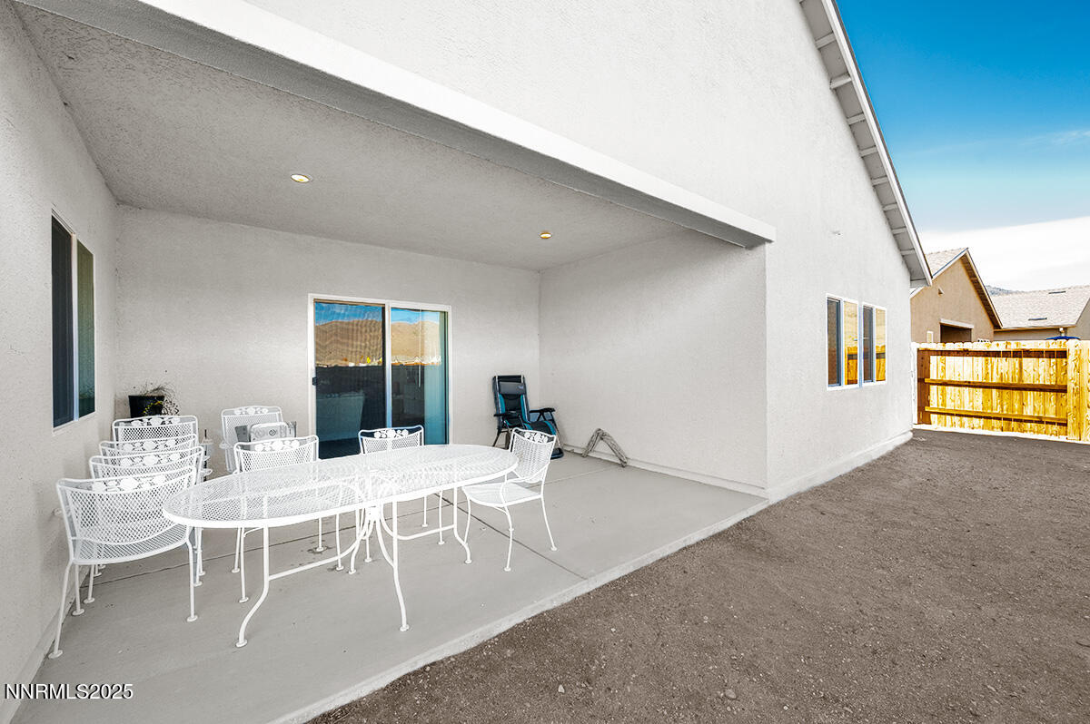 720 Butte Crk Road Dayton, NV 89403 - Photo 24 of 25 a view of a dining room with furniture and wooden floor