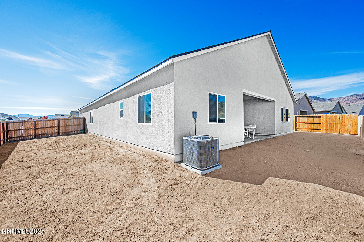 720 Butte Crk Road Dayton, NV 89403 - Photo 25 of 25 a view of a house with a backyard
