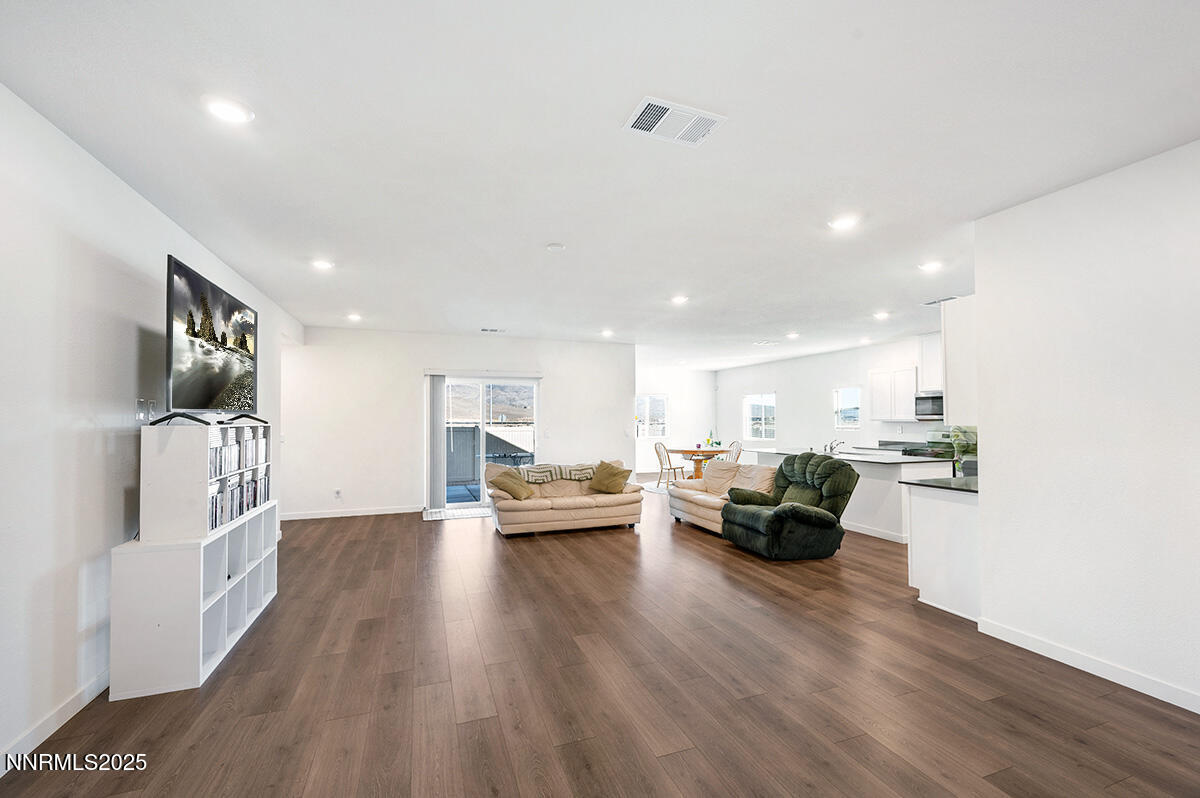 720 Butte Crk Road Dayton, NV 89403 - Photo 6 of 25 a living room with furniture and a wooden floor