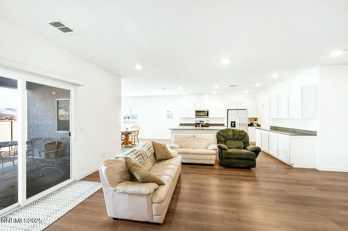 720 Butte Crk Road Dayton, NV 89403 - Photo 8 of 25 a living room with furniture and kitchen view