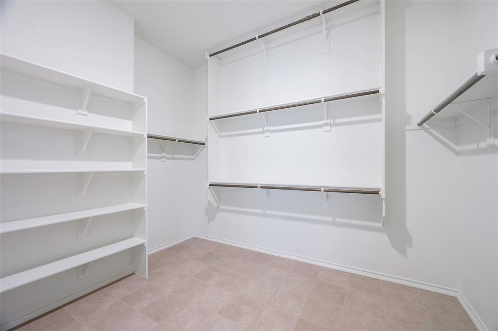 941 Leola Lane Allen, TX 75013 - Photo 10 of 37 a view of an empty walk in closet