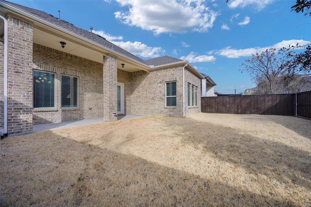 941 Leola Lane Allen, TX 75013 - Photo 33 of 37 a view of a house with a snow in the yard