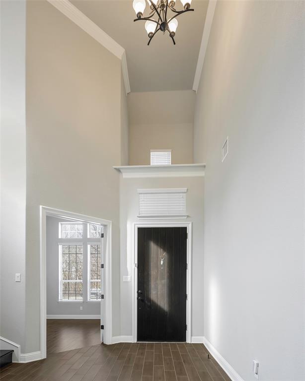 941 Leola Lane Allen, TX 75013 - Photo 3 of 37 a view of an empty room with a fireplace