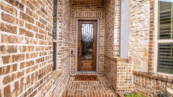 a bedroom with furniture and a fireplace