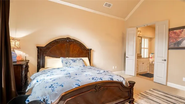 a bathroom with a granite countertop tub sink a mirror a shower and vanity