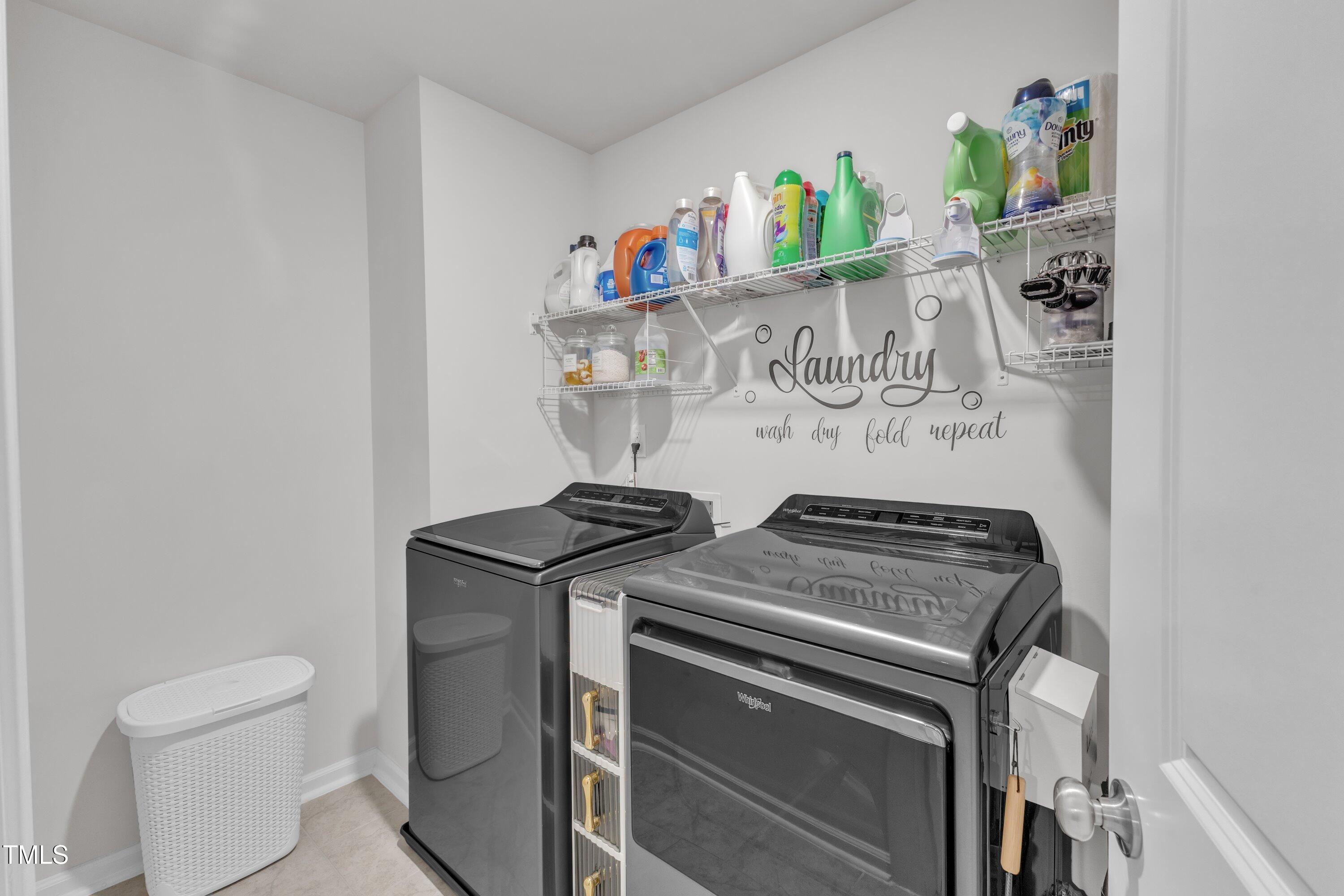 5814 Empathy Lane Raleigh, NC 27616 - Photo 37 of 48 a utility room with dryer and washer