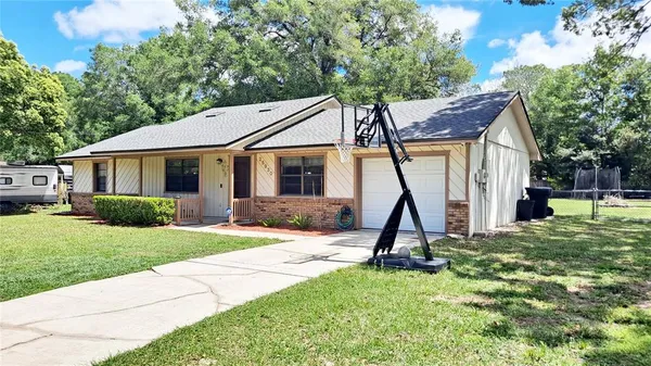 $299,900 | 25930 Sackamaxon Drive, Sorrento, FL 32776