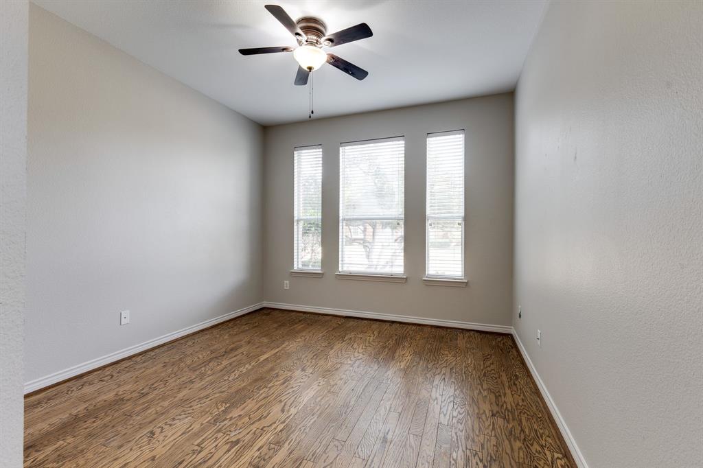 3008 Chippenham Drive Plano, TX 75093 - Photo 16 of 25 wooden floor in an empty room with a window